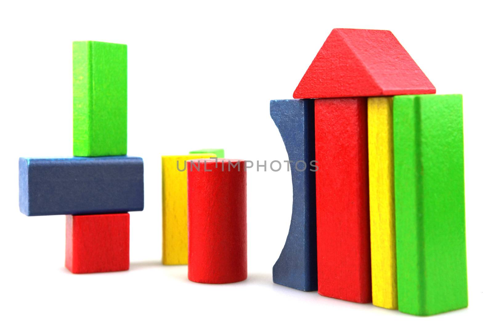 Wooden building blocks isolated on white background