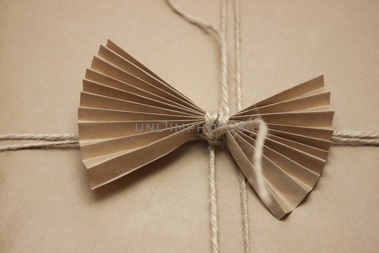 Vintage gift design with a paper bow