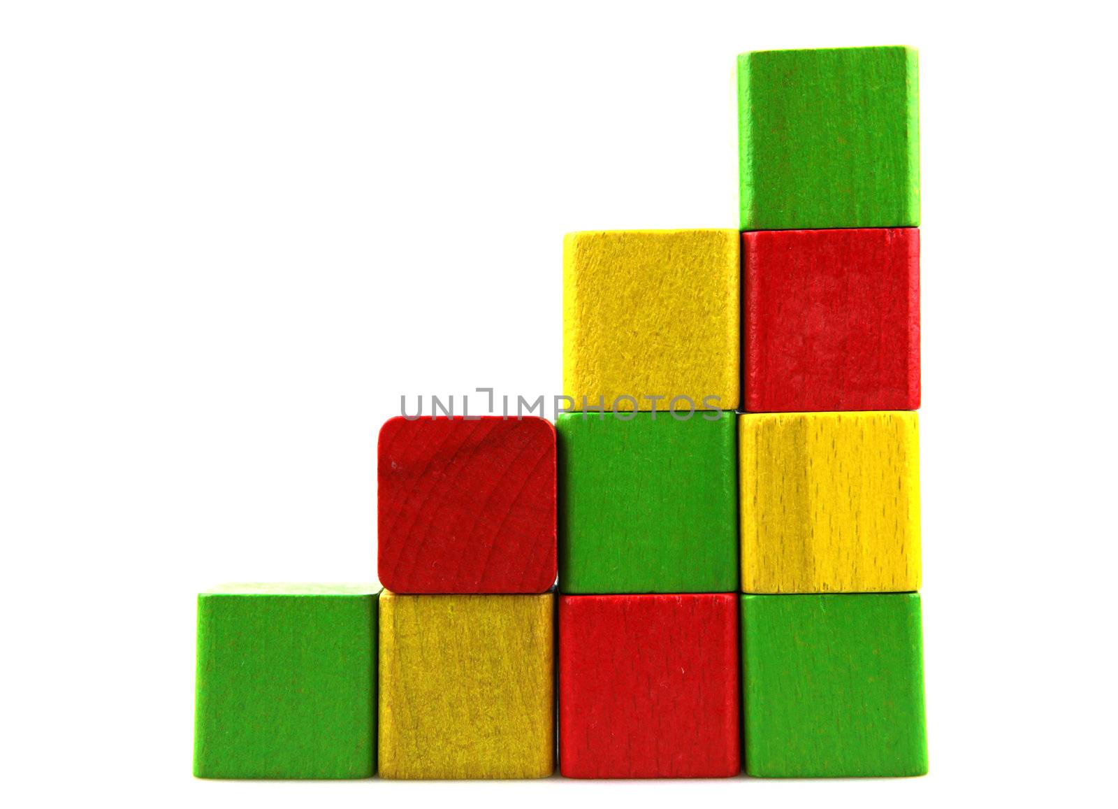 Wooden building blocks isolated on white background