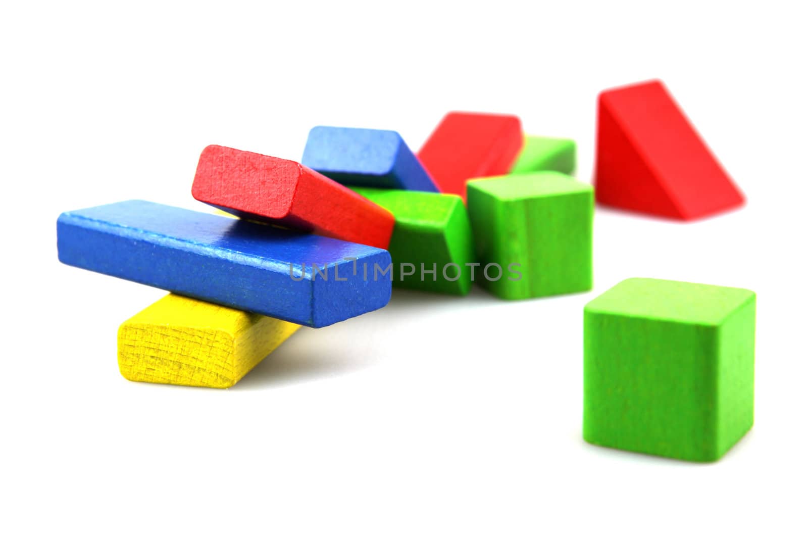 Wooden building blocks isolated on white background