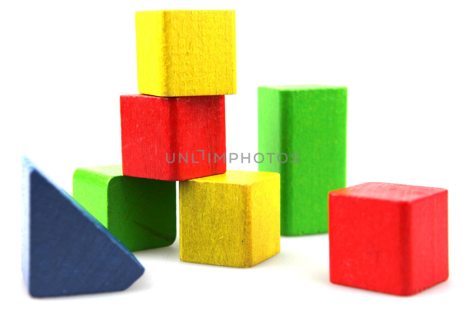 Wooden building blocks isolated on white background