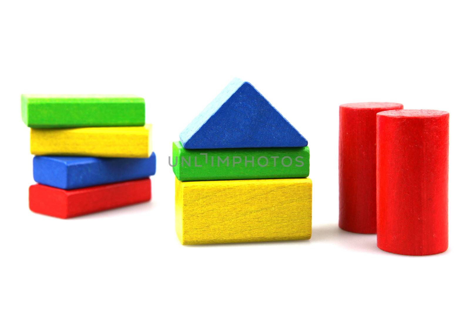 Wooden building blocks isolated on white background