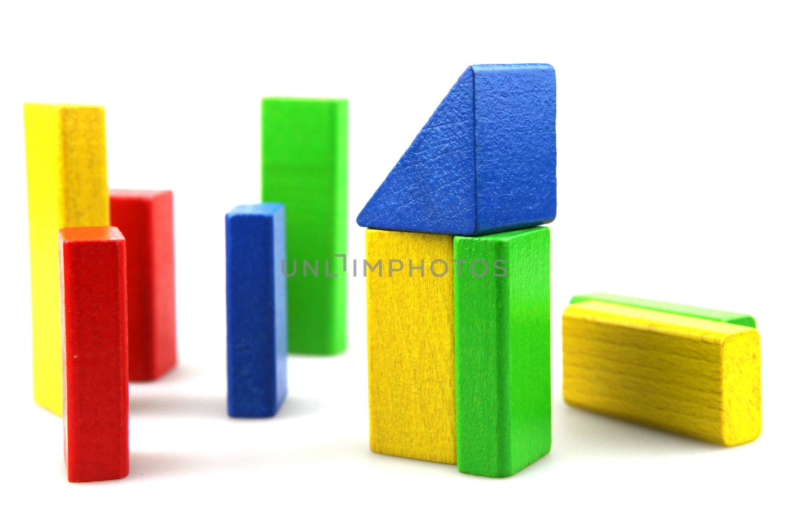 Wooden building blocks isolated on white background