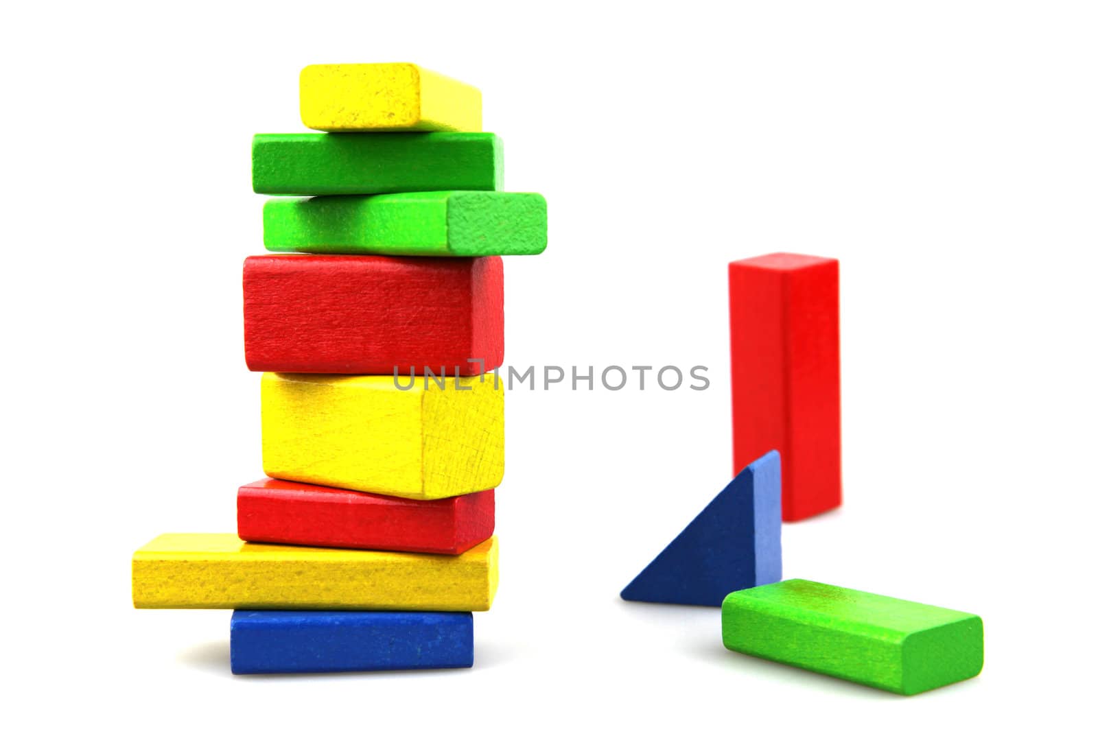 Wooden building blocks isolated on white background
