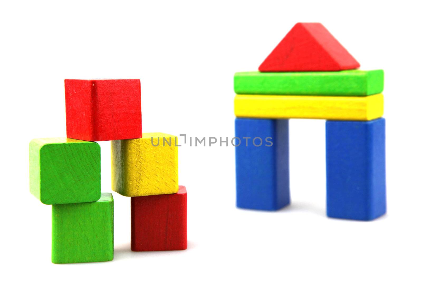 Wooden building blocks isolated on white background
