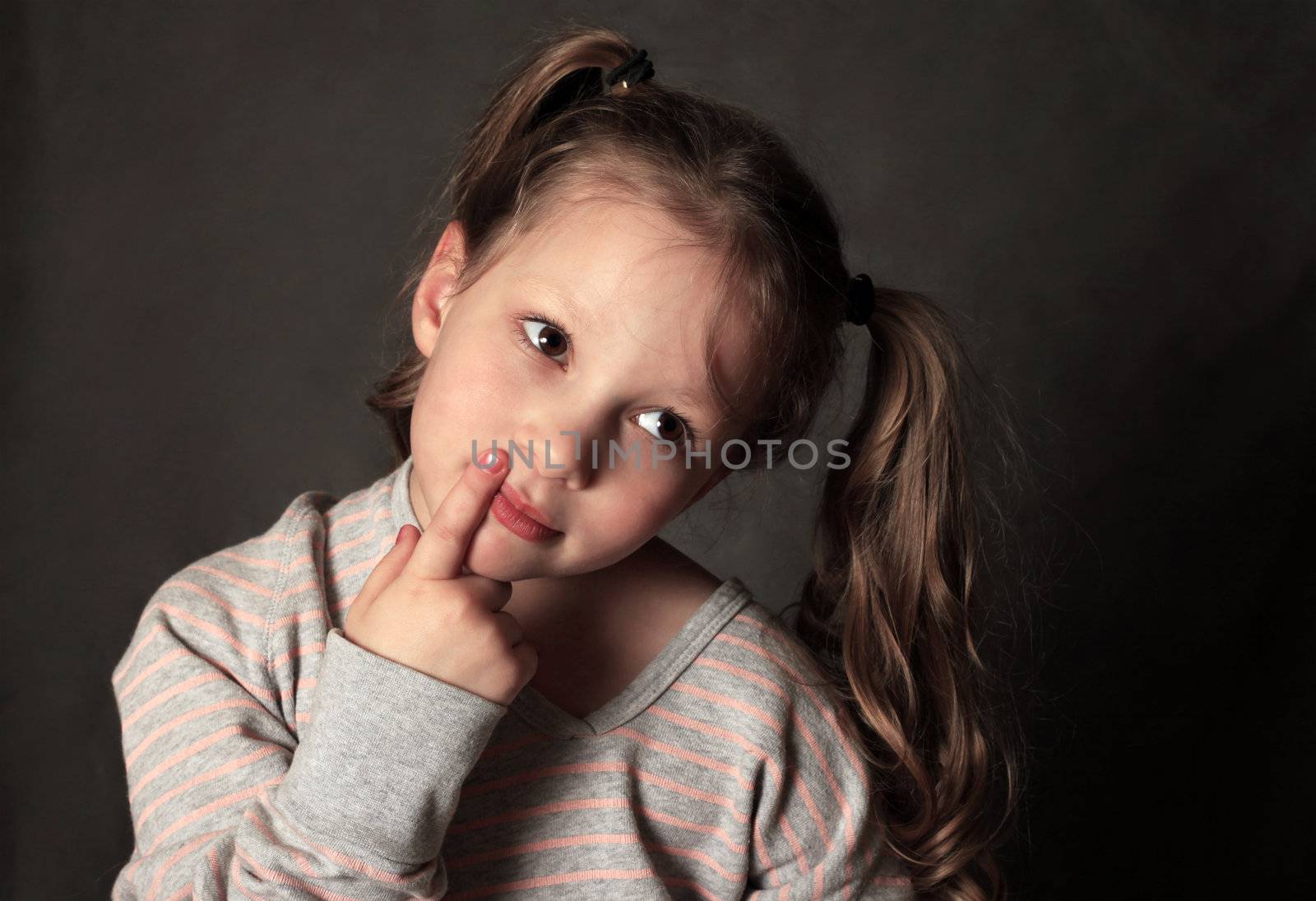 Portrait 5 years girl in studio by friday