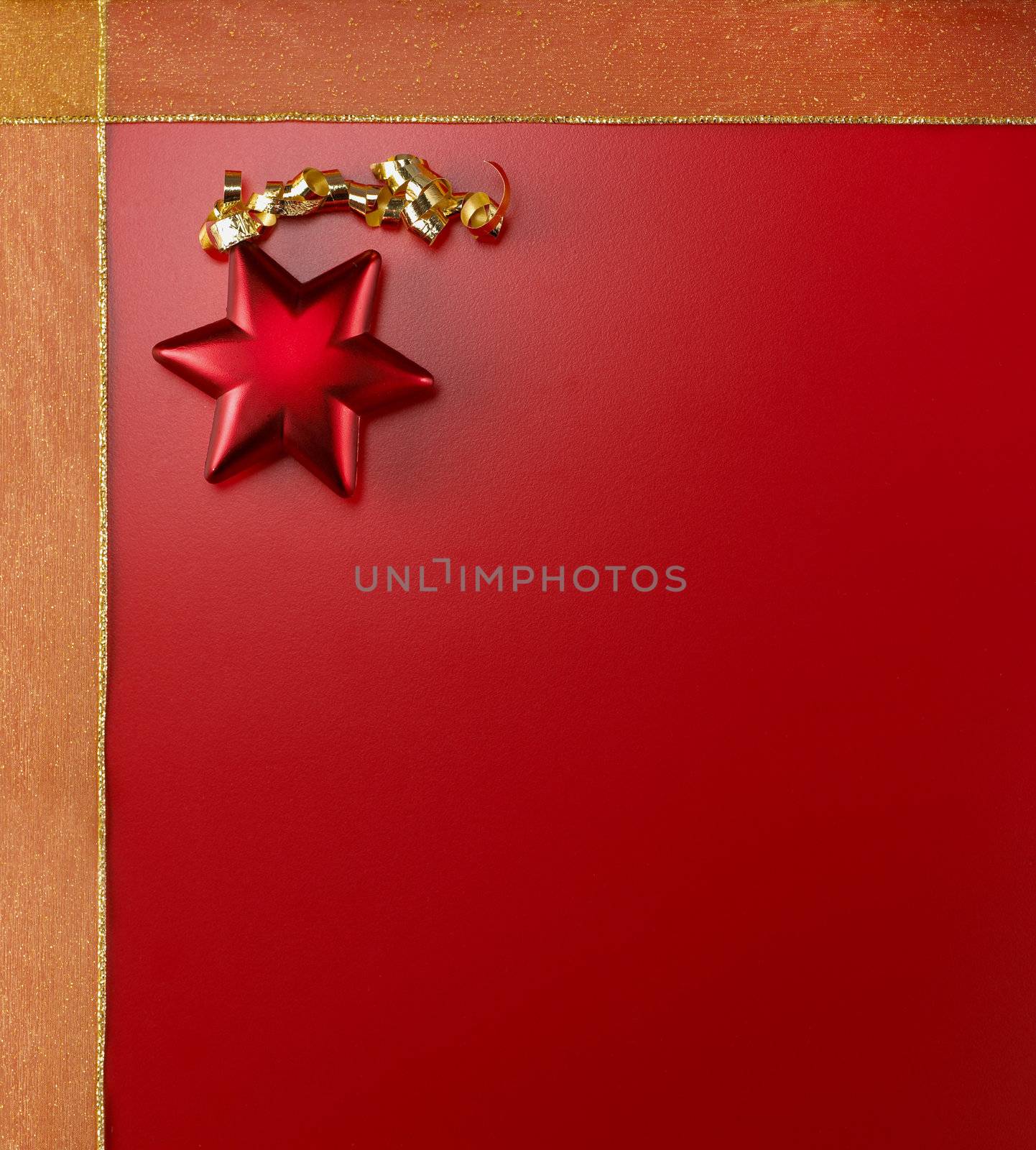 Christmas ornaments on a red background with copy space.