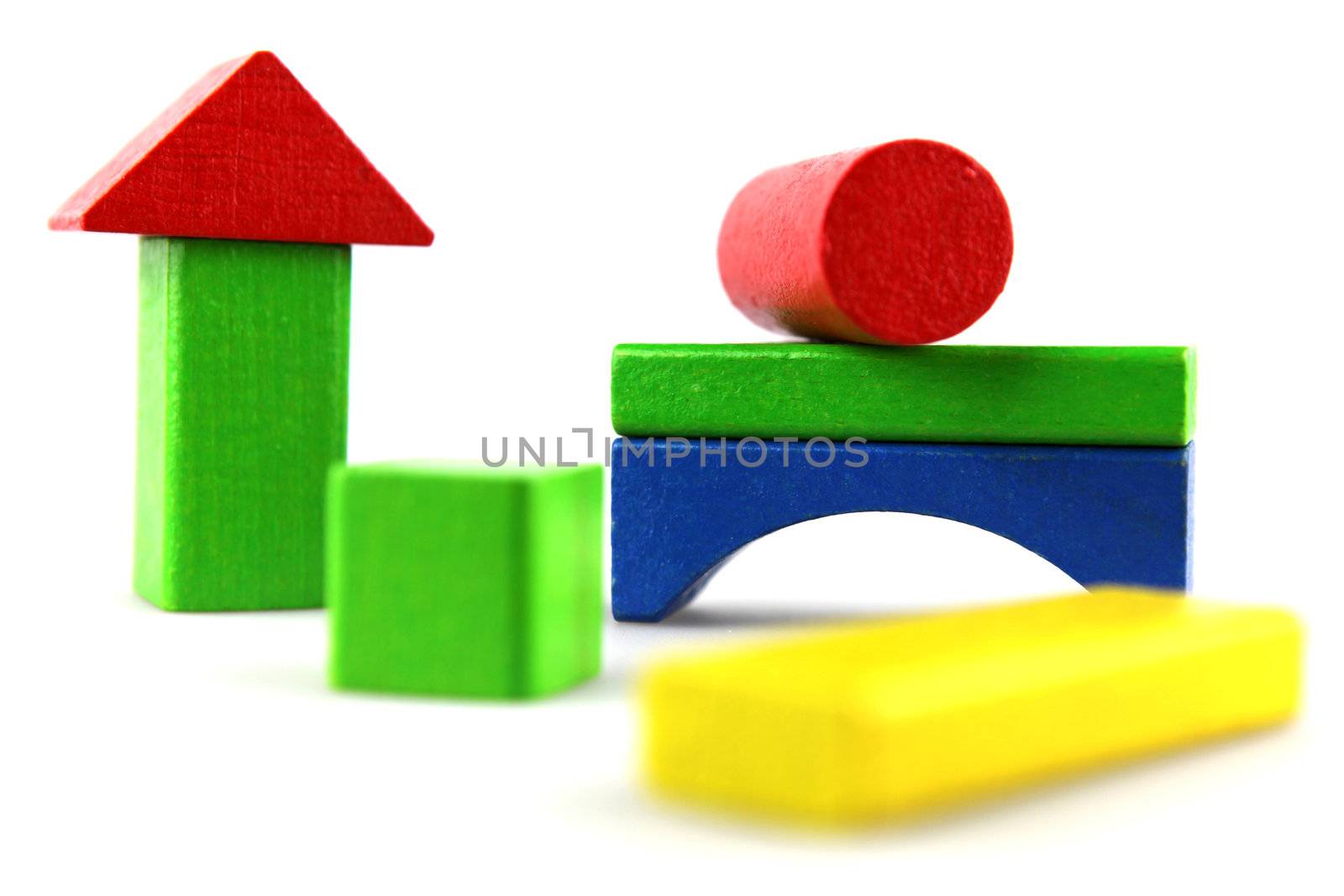 Wooden building blocks isolated on white background