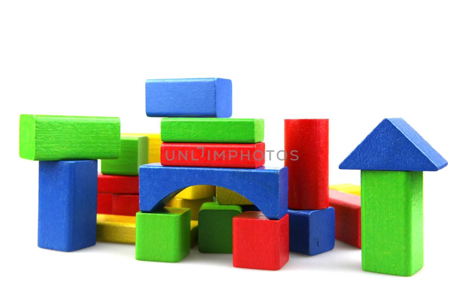 Wooden building blocks isolated on white background