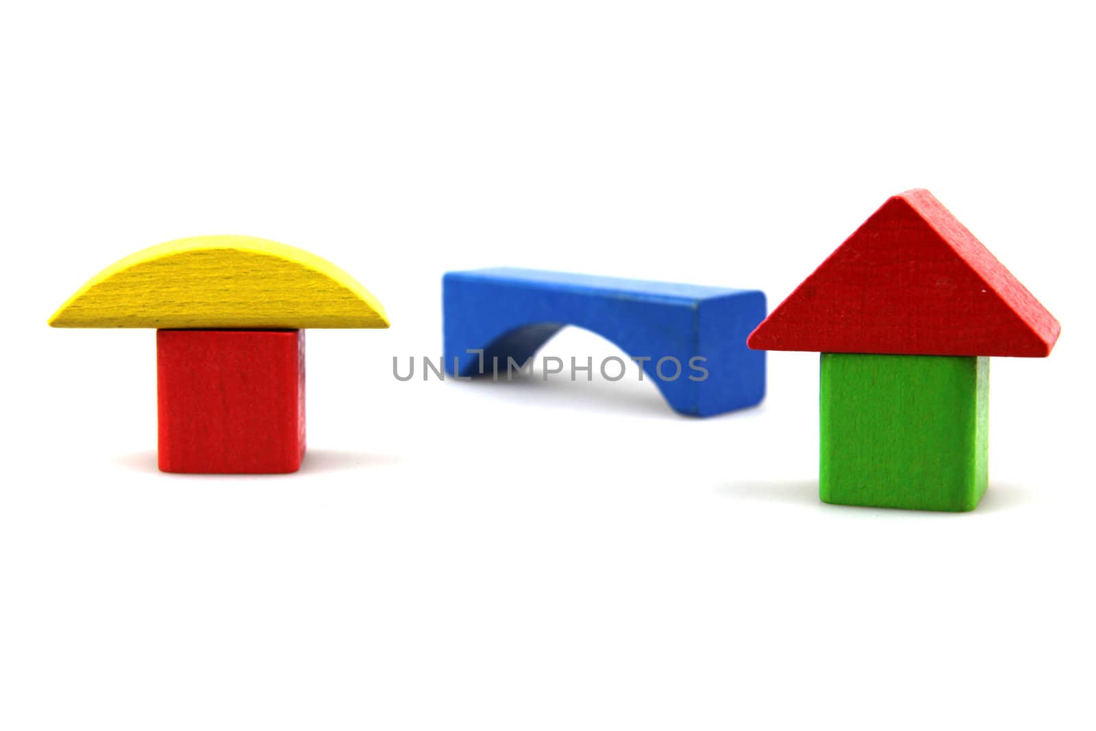 Wooden building blocks isolated on white background