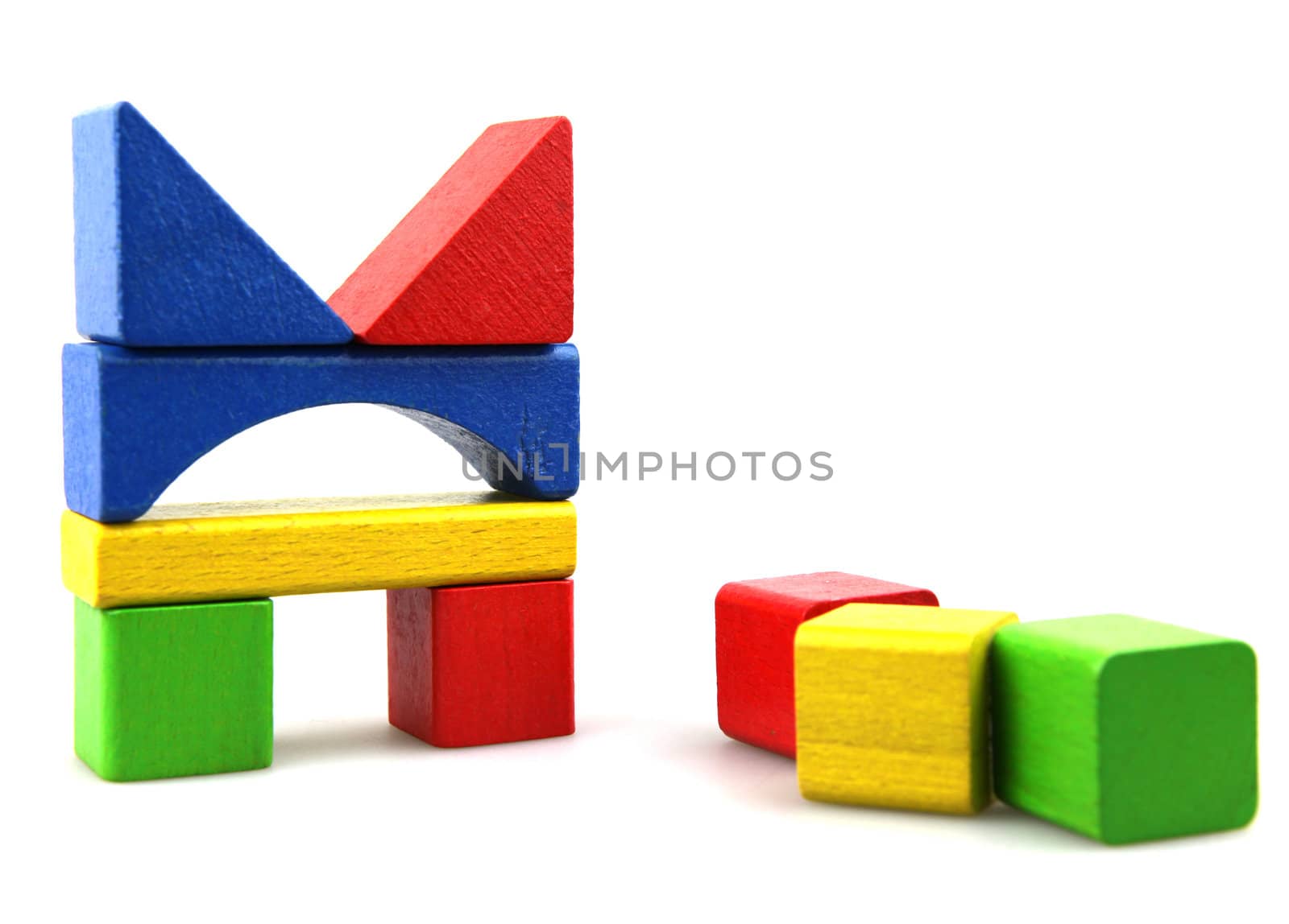 Wooden building blocks isolated on white background