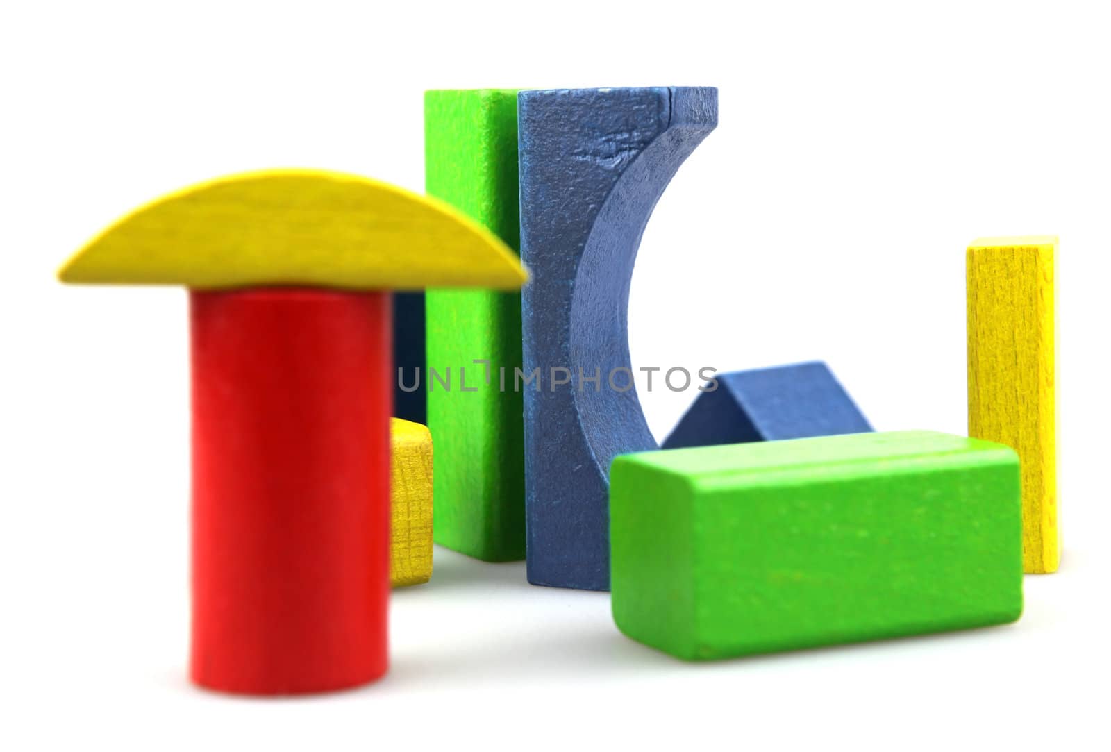 Wooden building blocks isolated on white background