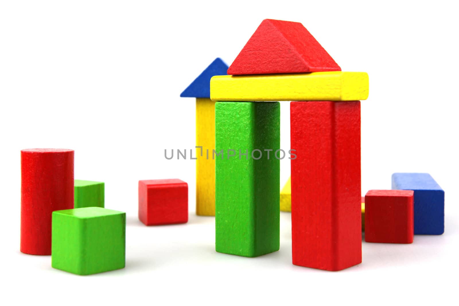 Wooden building blocks isolated on white background