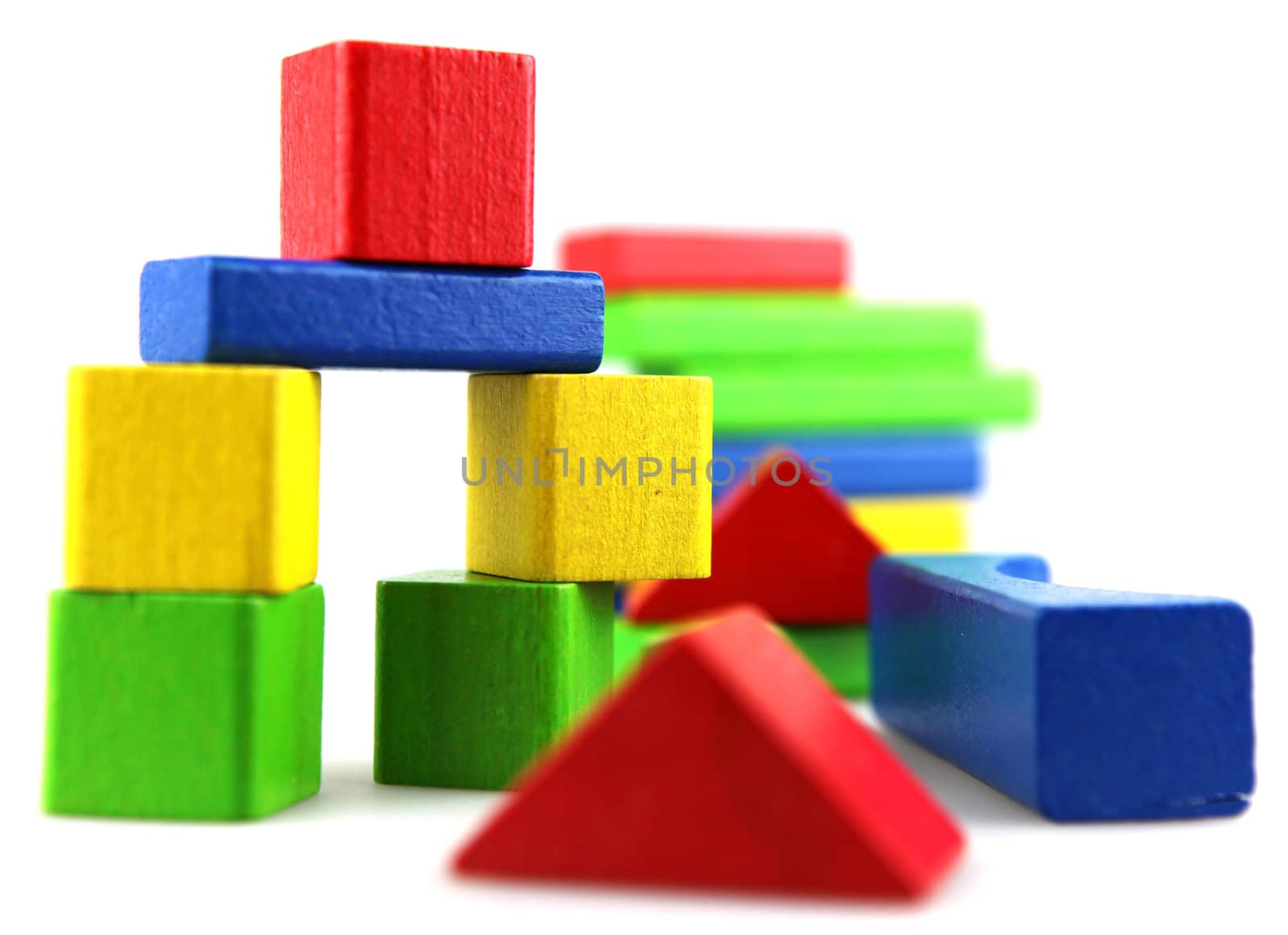 Wooden building blocks isolated on white background