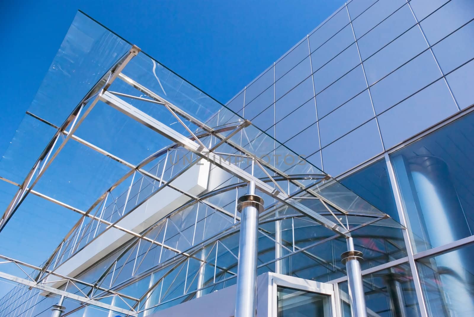 streets reflected in the glass roof of modern building