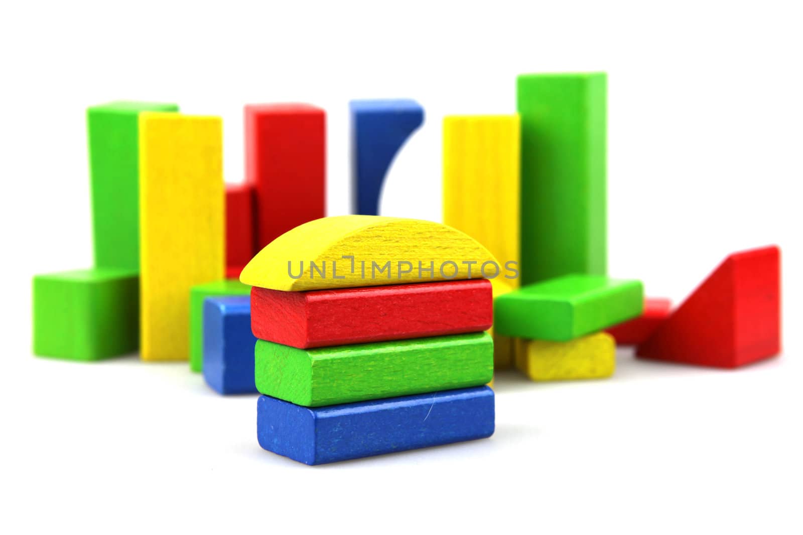 Wooden building blocks isolated on white background