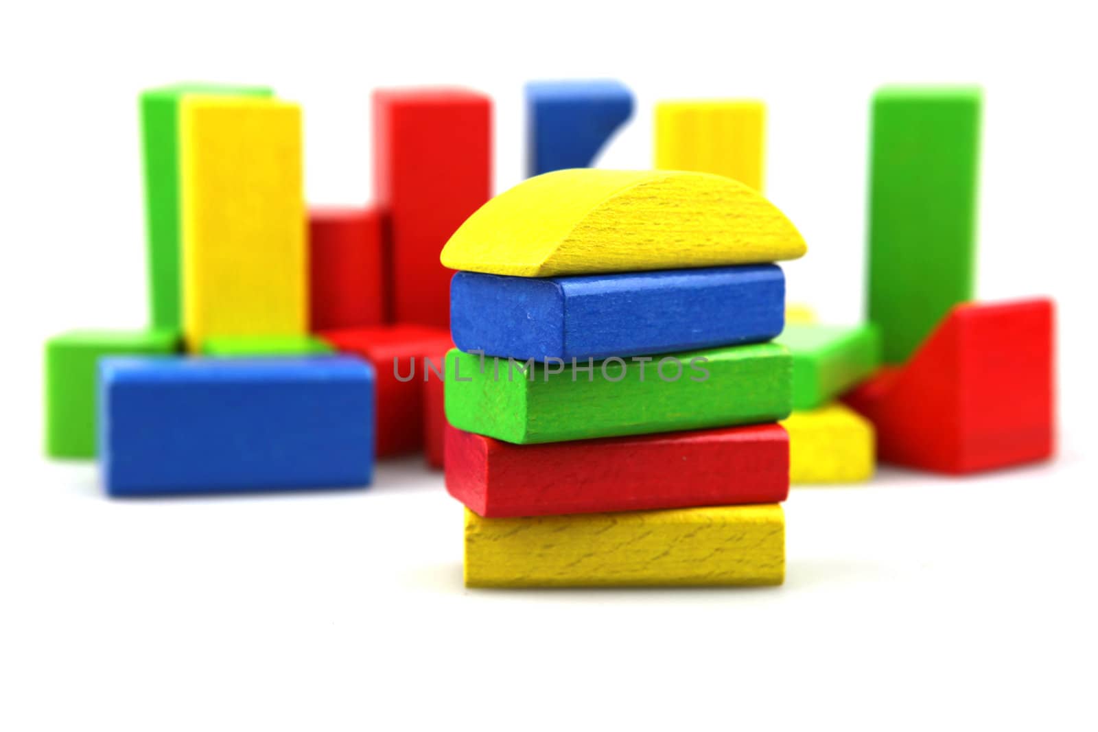 Wooden building blocks isolated on white background