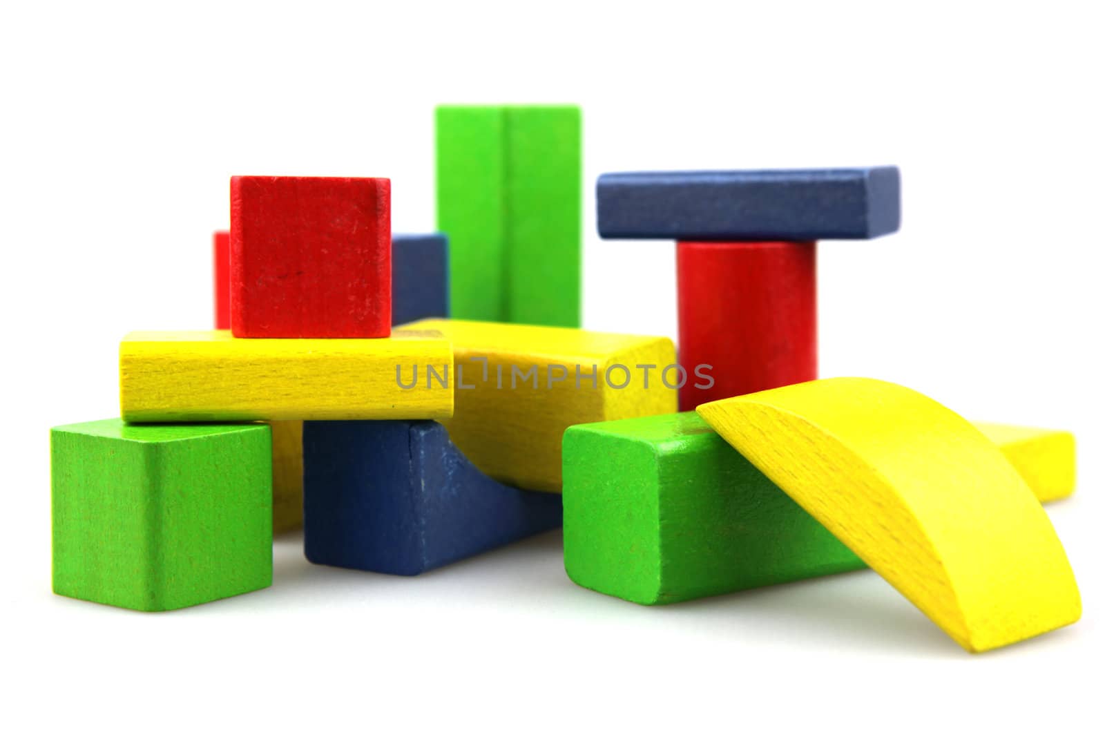 Wooden building blocks isolated on white background