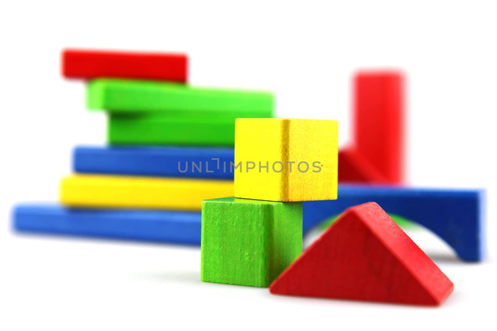 Wooden building blocks isolated on white background