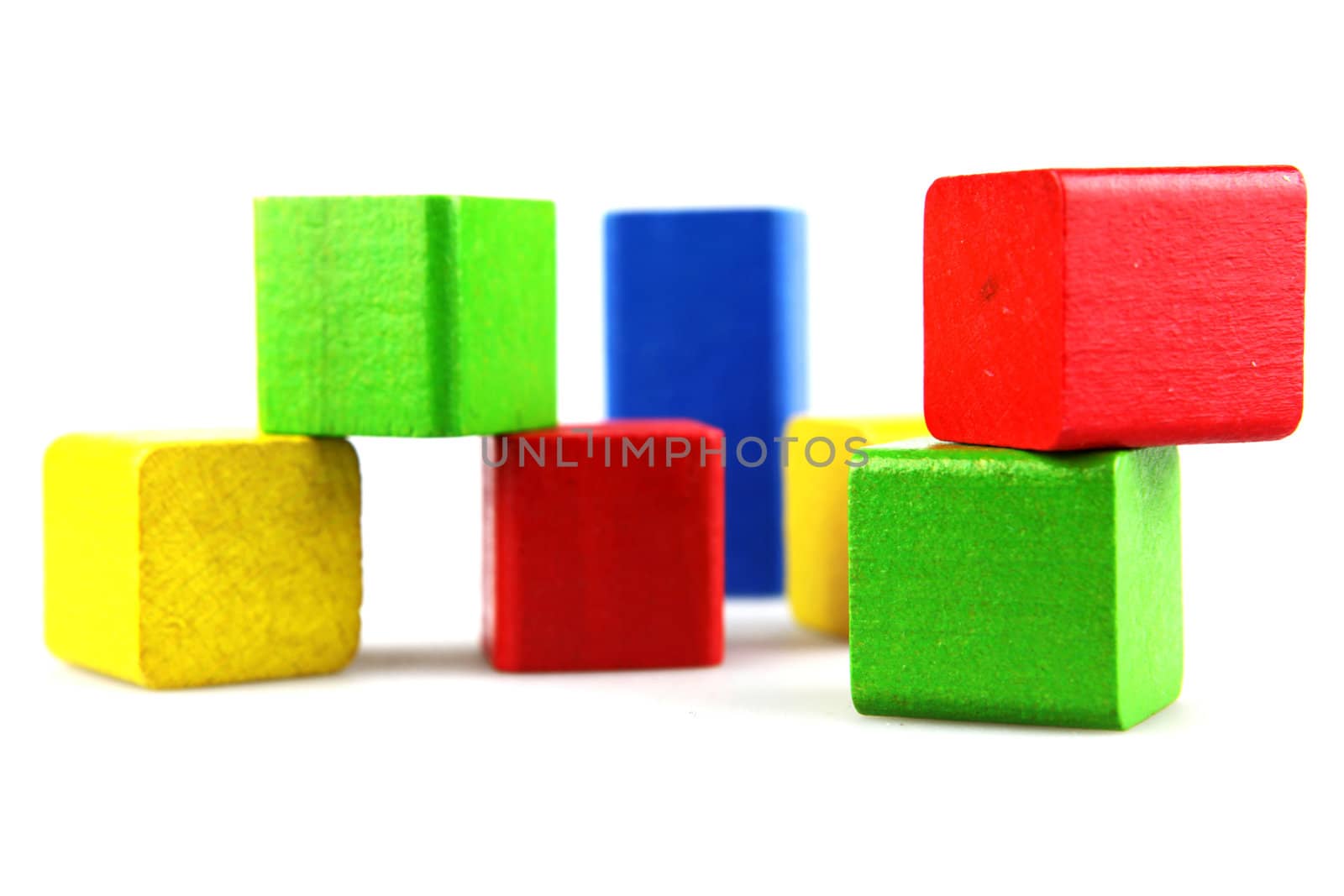 Wooden building blocks isolated on white background