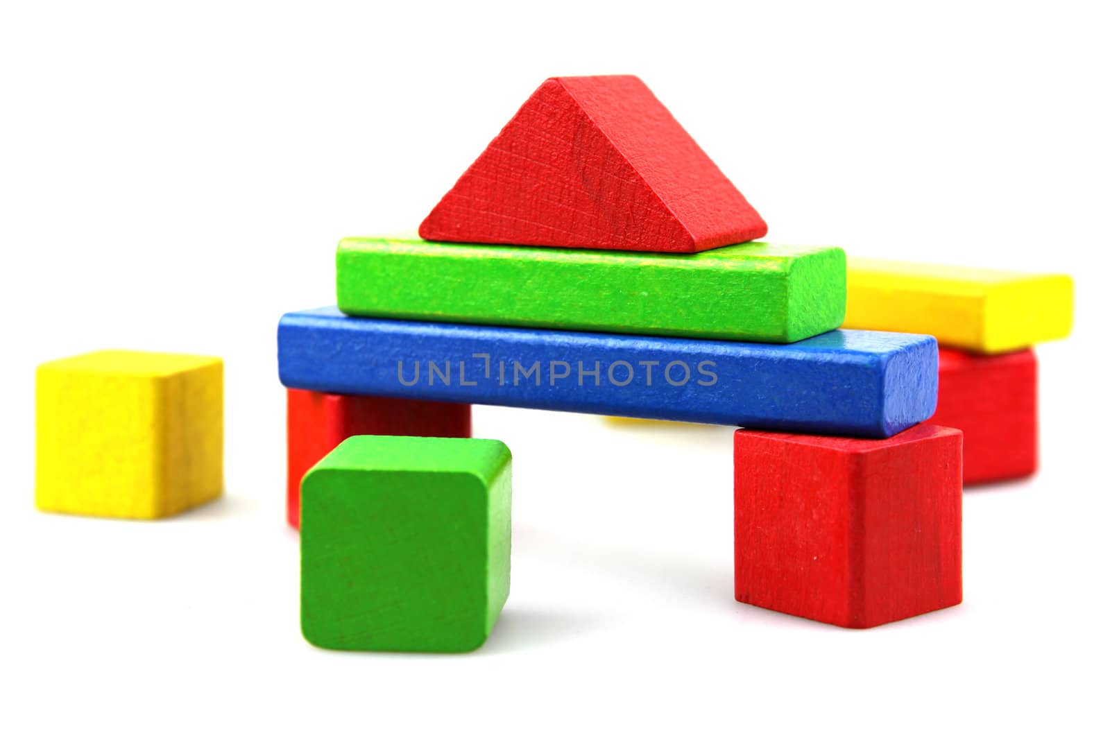 Wooden building blocks isolated on white background