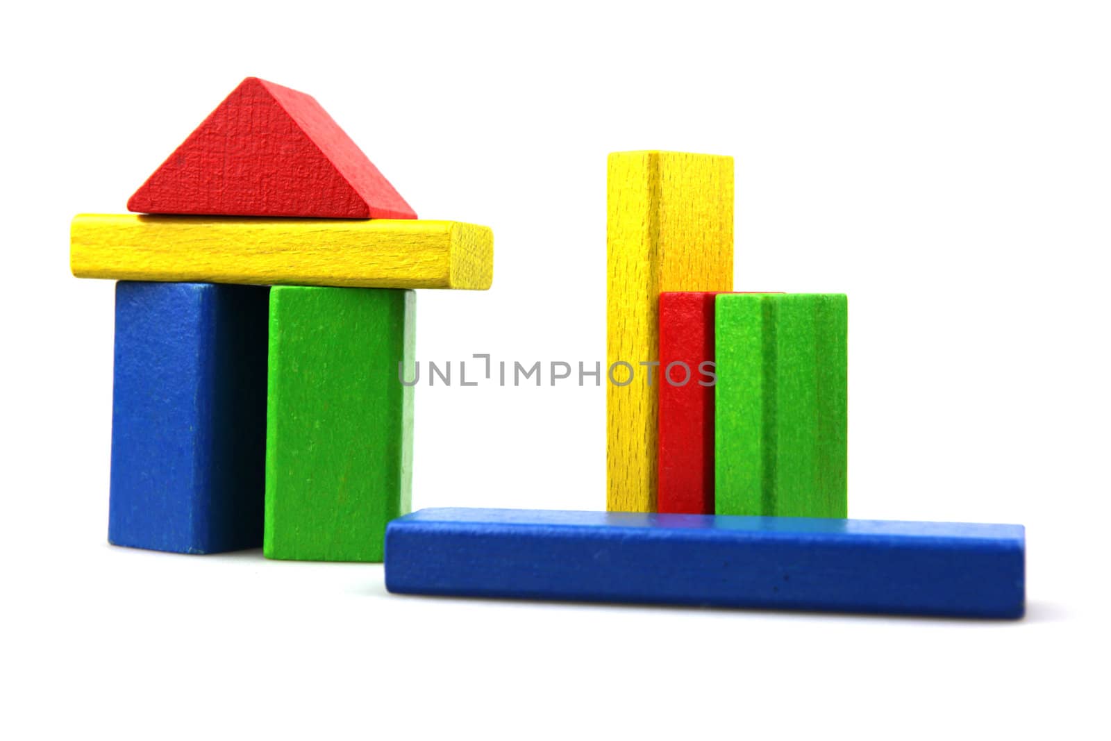 Wooden building blocks isolated on white background