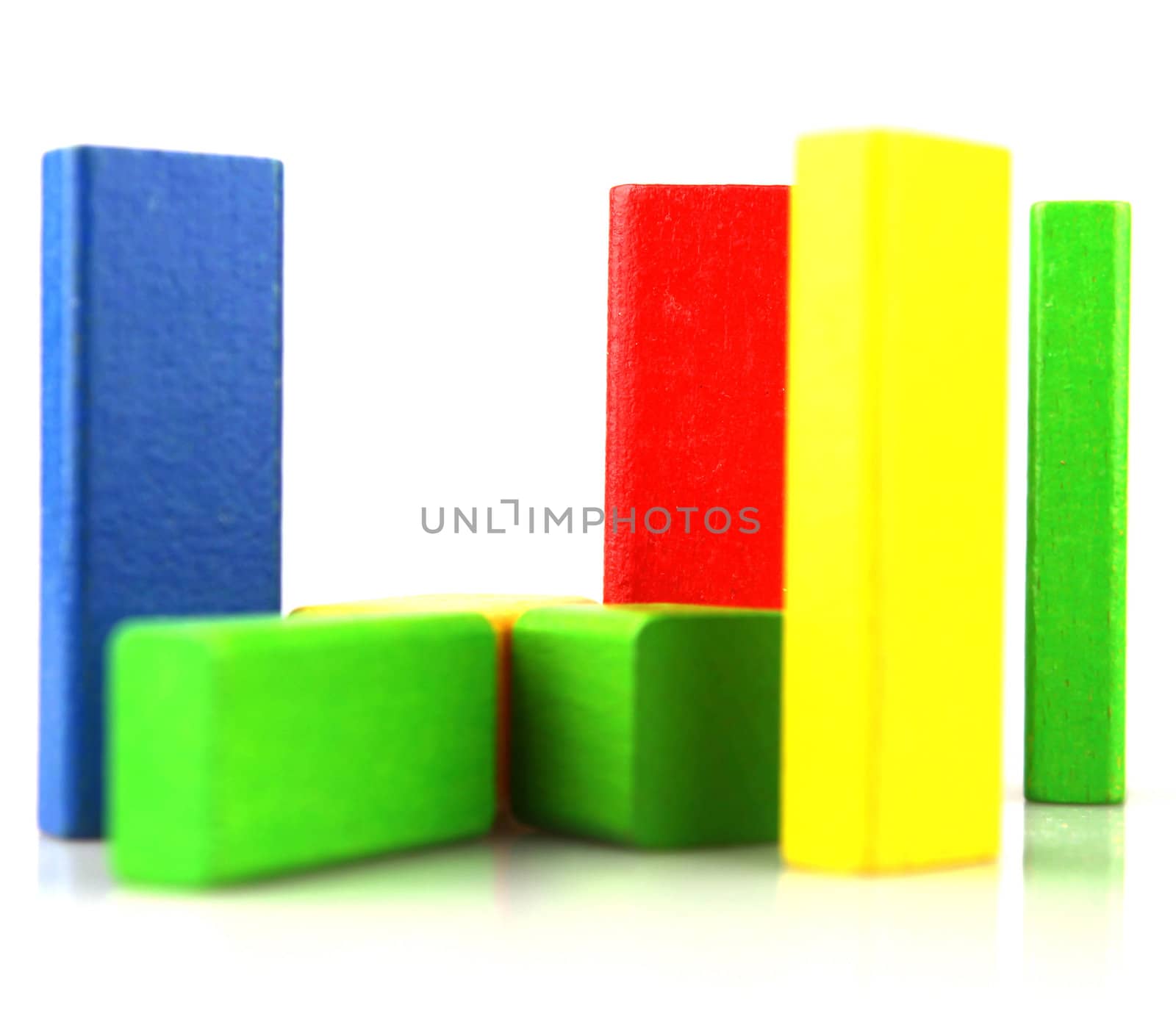 Wooden building blocks isolated on white background