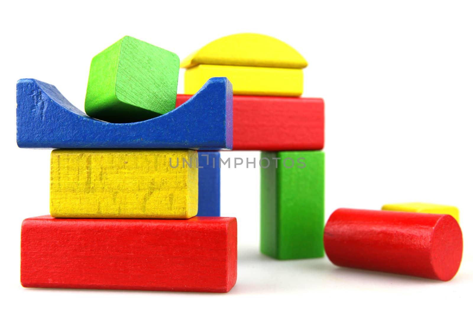 Wooden building blocks isolated on white background