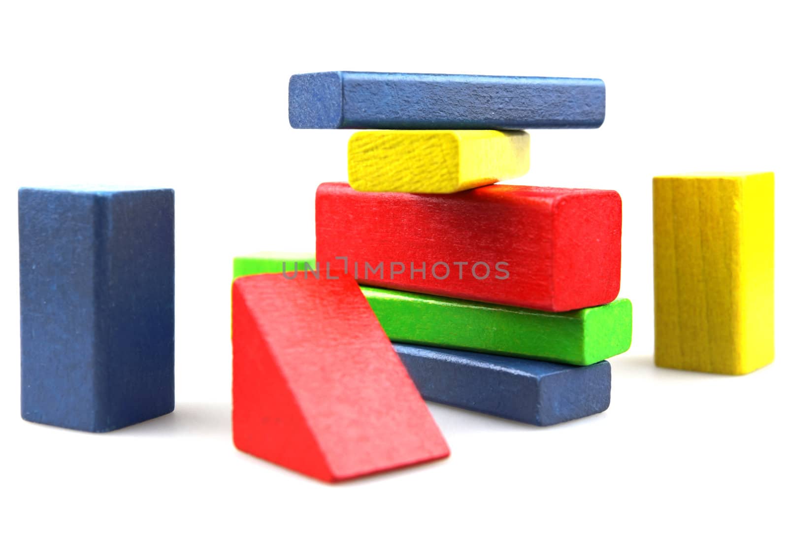 Wooden building blocks isolated on white background