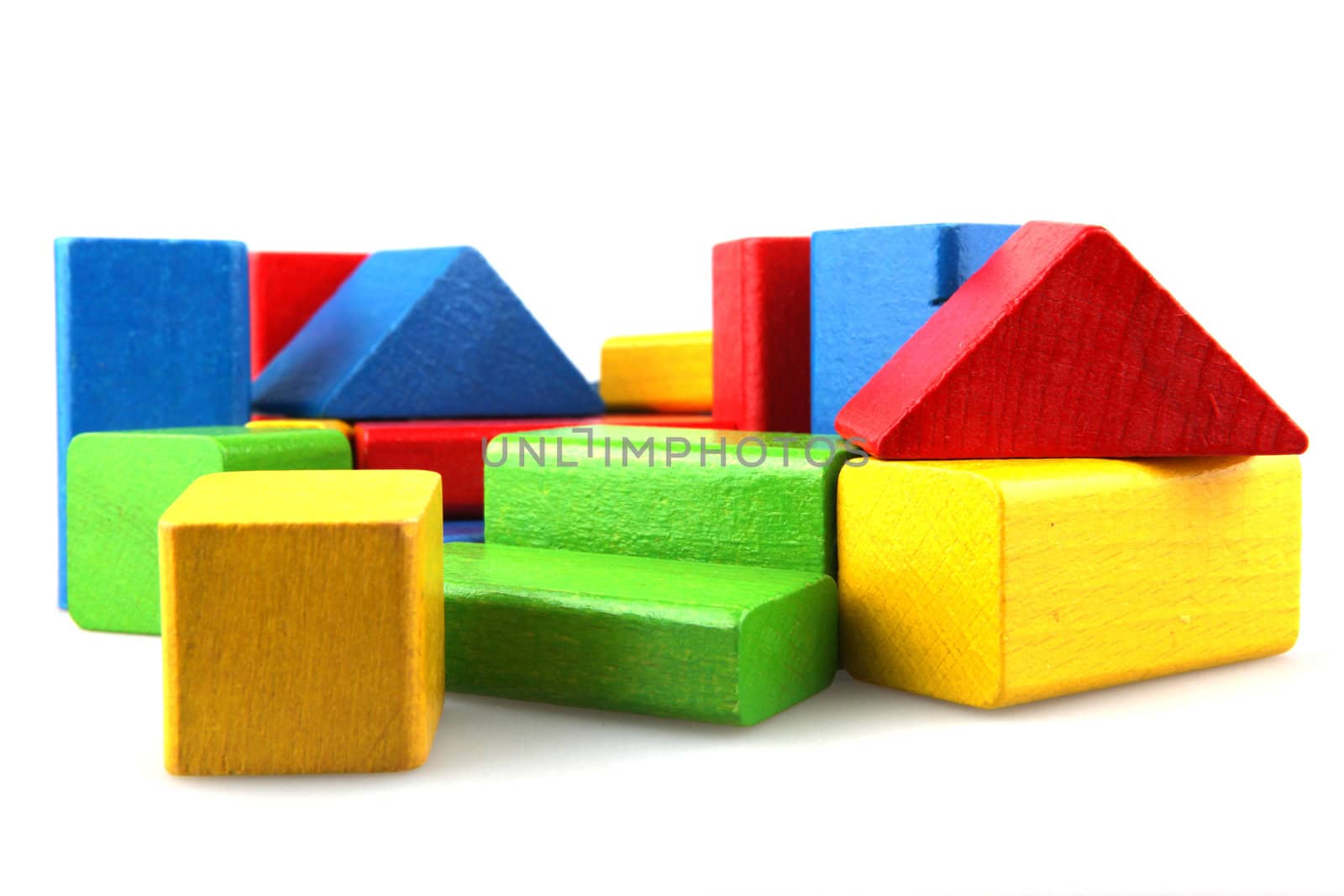 Wooden building blocks isolated on white background