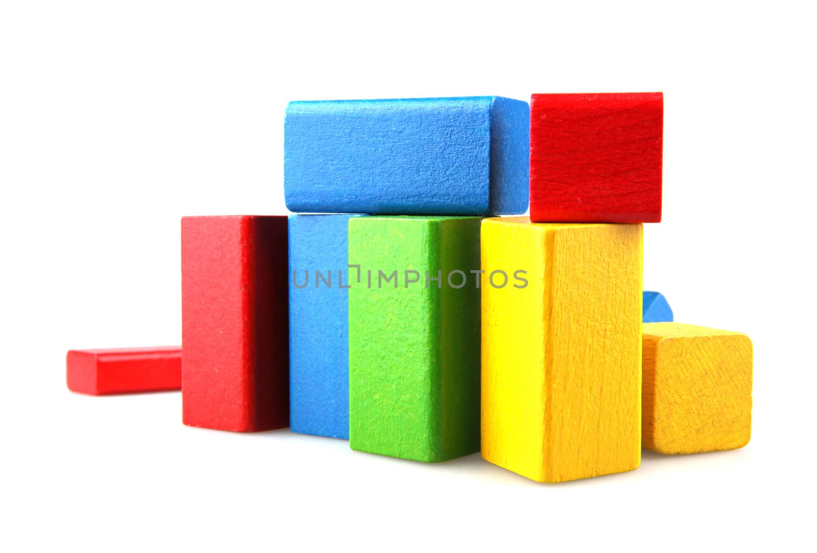 Wooden building blocks isolated on white background