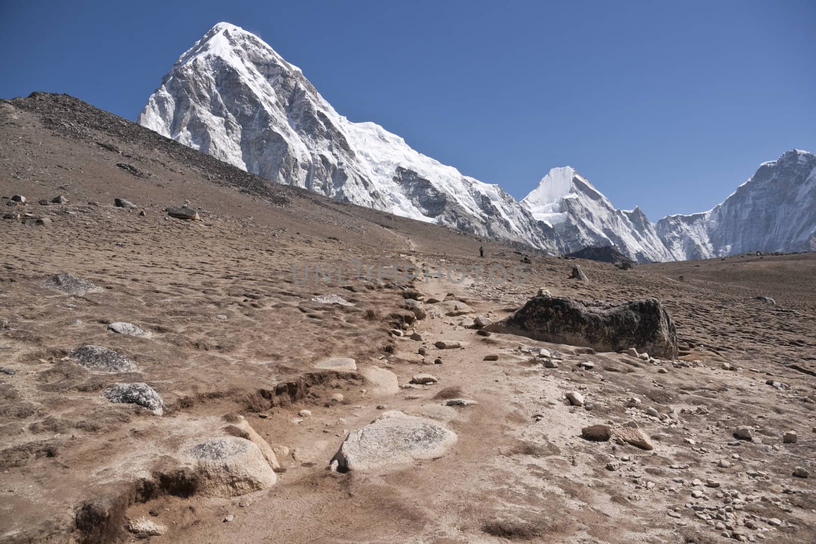 Track in the Himalaya Mountains leading to Kala Patthar (5550m) and views of Everest Base Camp.