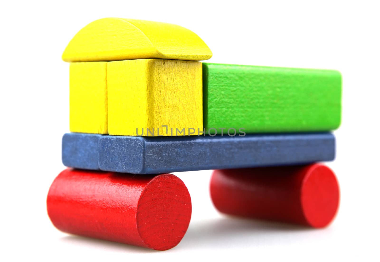 Wooden building blocks isolated on white background