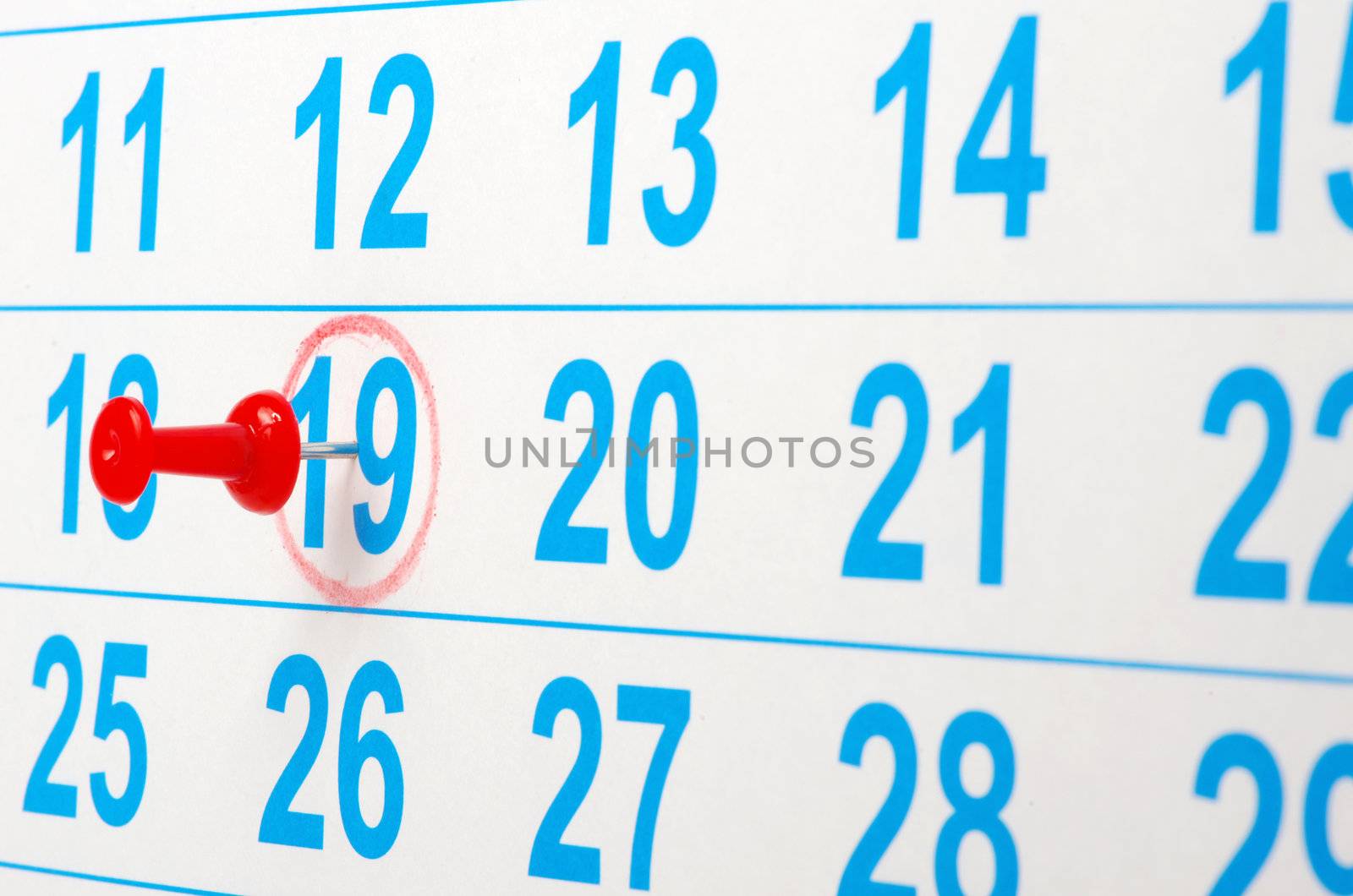 Red circle on a calendar concept for an important day