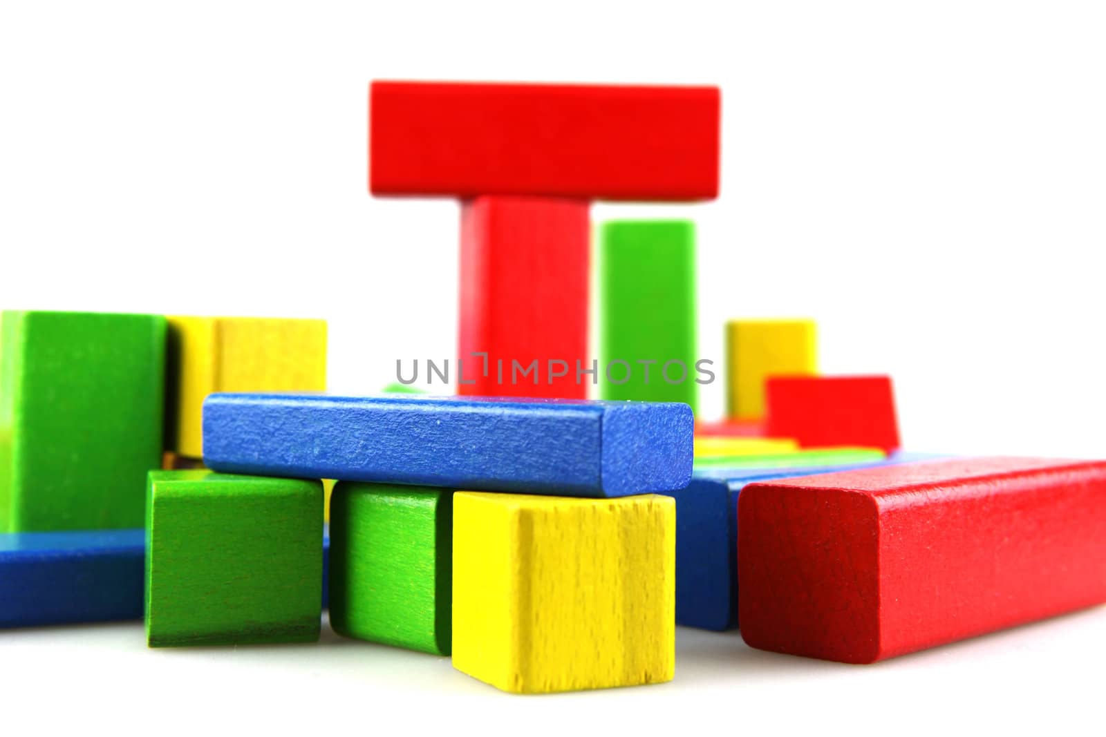Wooden building blocks isolated on white background