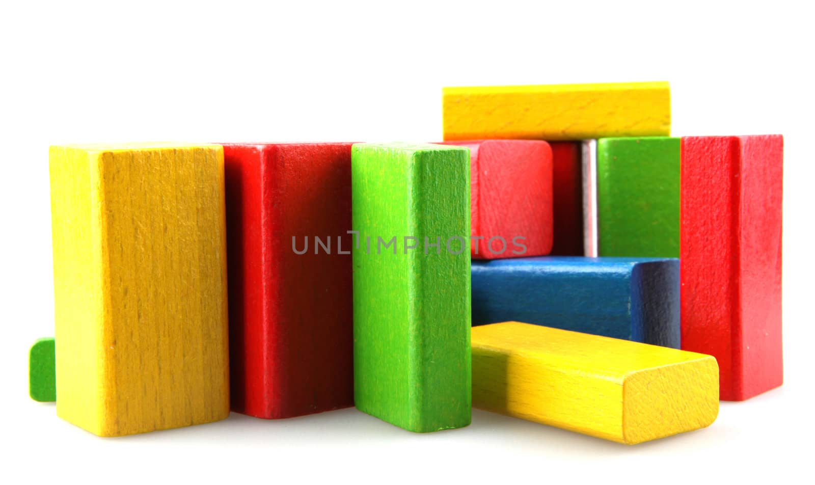 Wooden building blocks isolated on white background