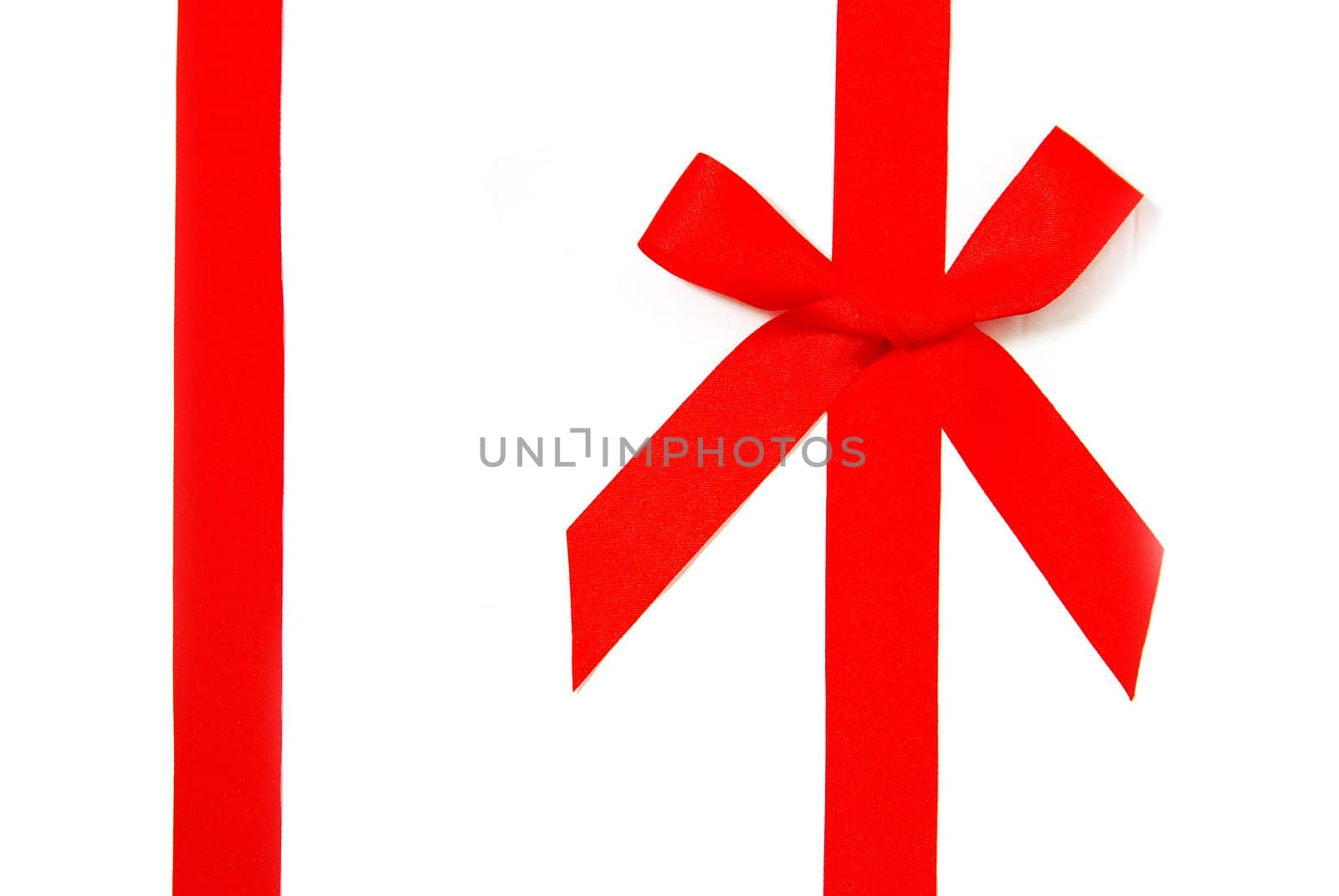 red holiday bow on white background