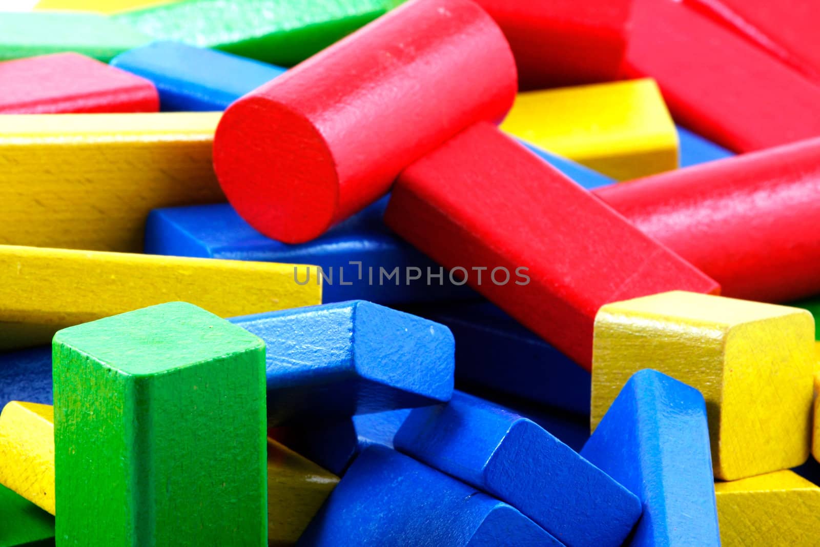 Wooden building blocks isolated on white background