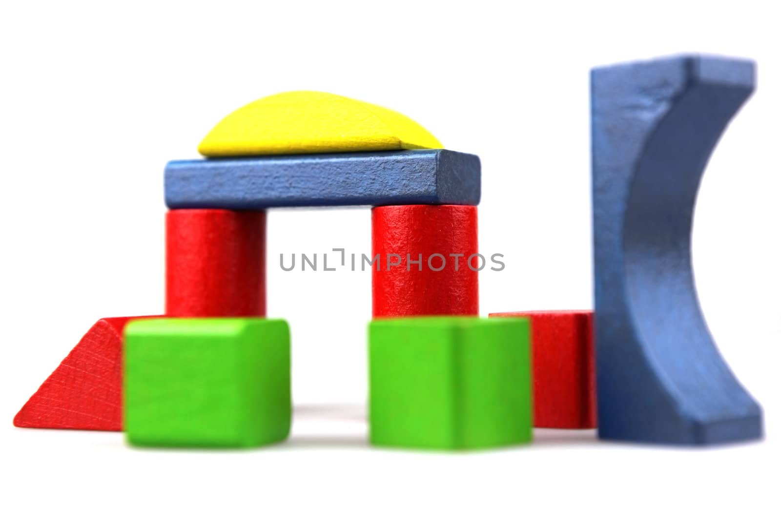 Wooden building blocks isolated on white background