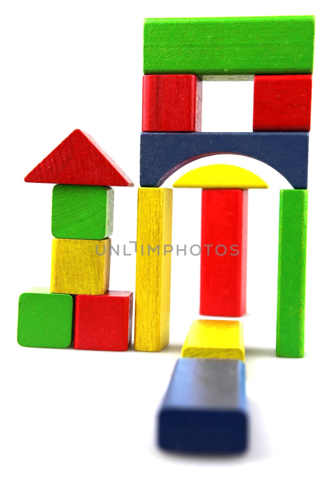 Wooden building blocks isolated on white background