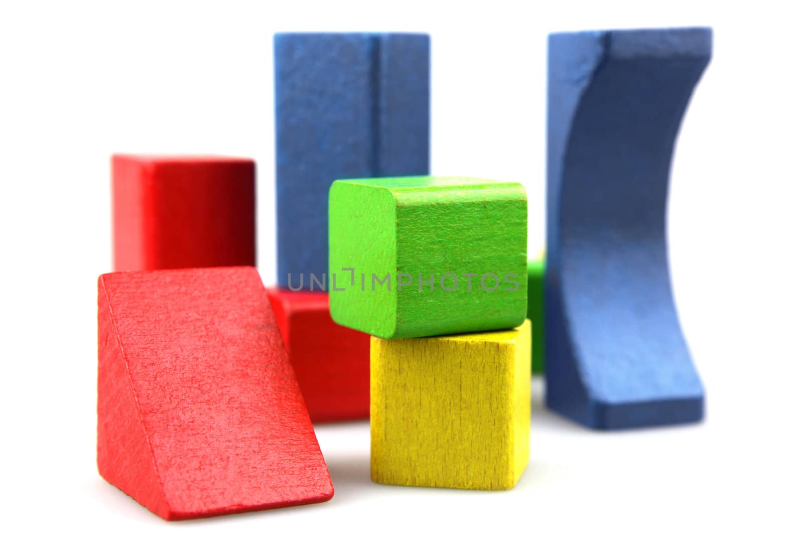 Wooden building blocks isolated on white background