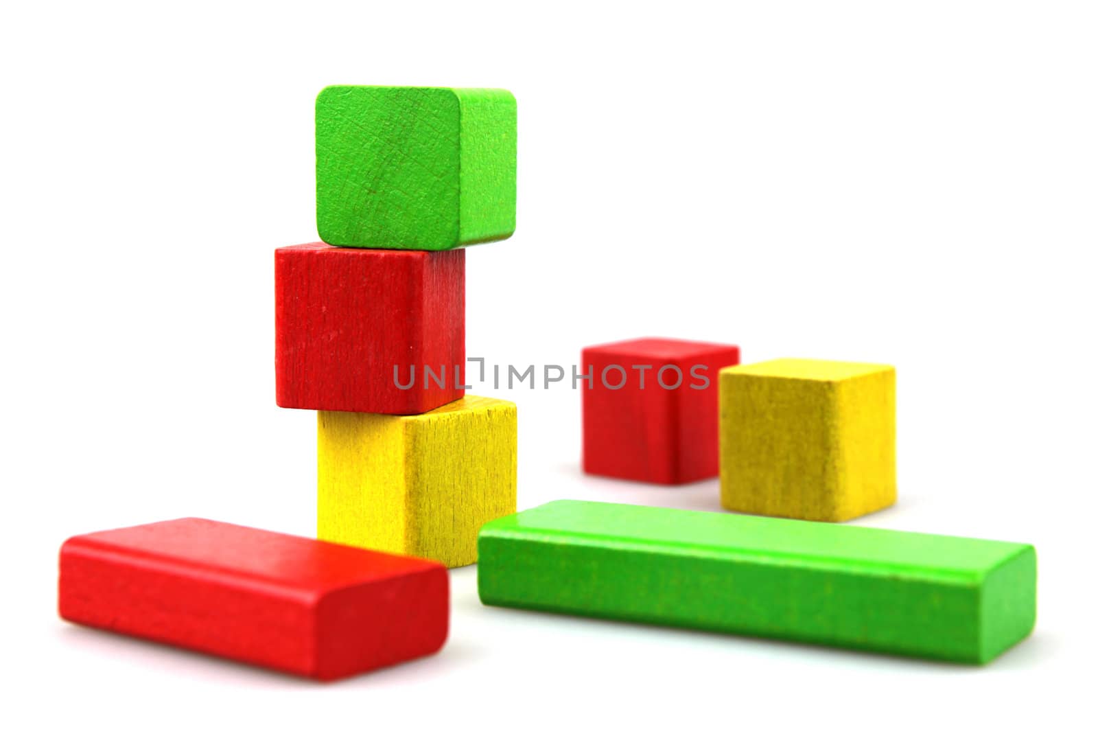 Wooden building blocks isolated on white background