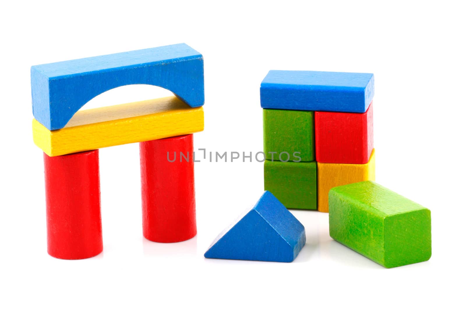 Wooden building blocks isolated on white background