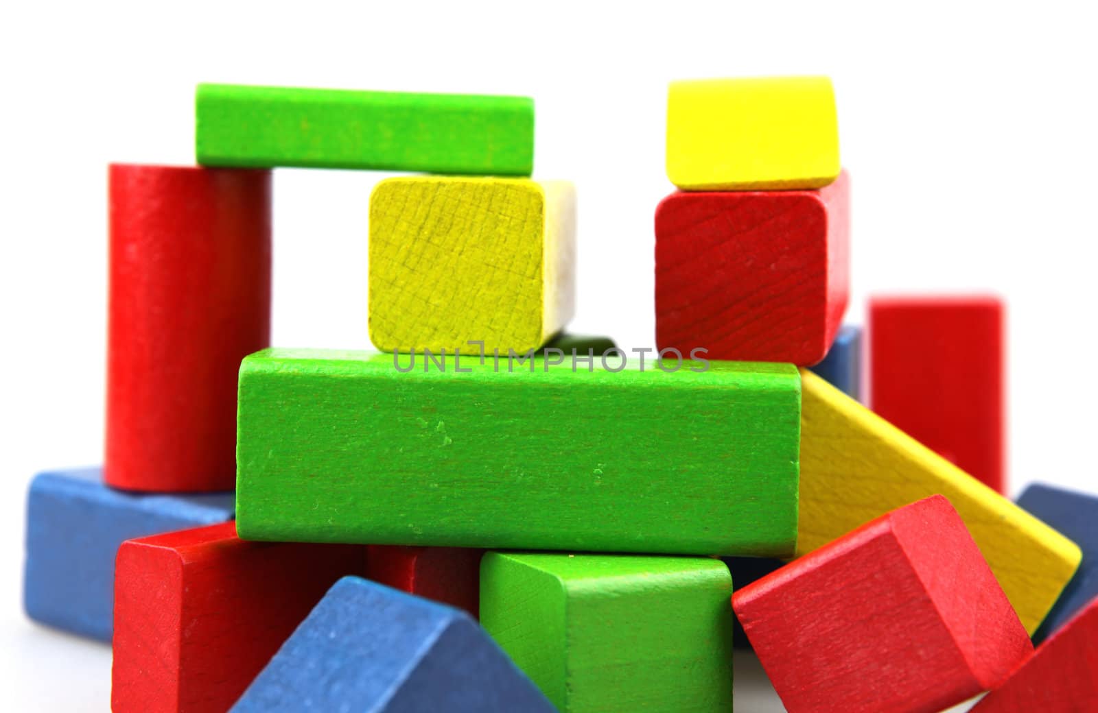 Wooden building blocks isolated on white background