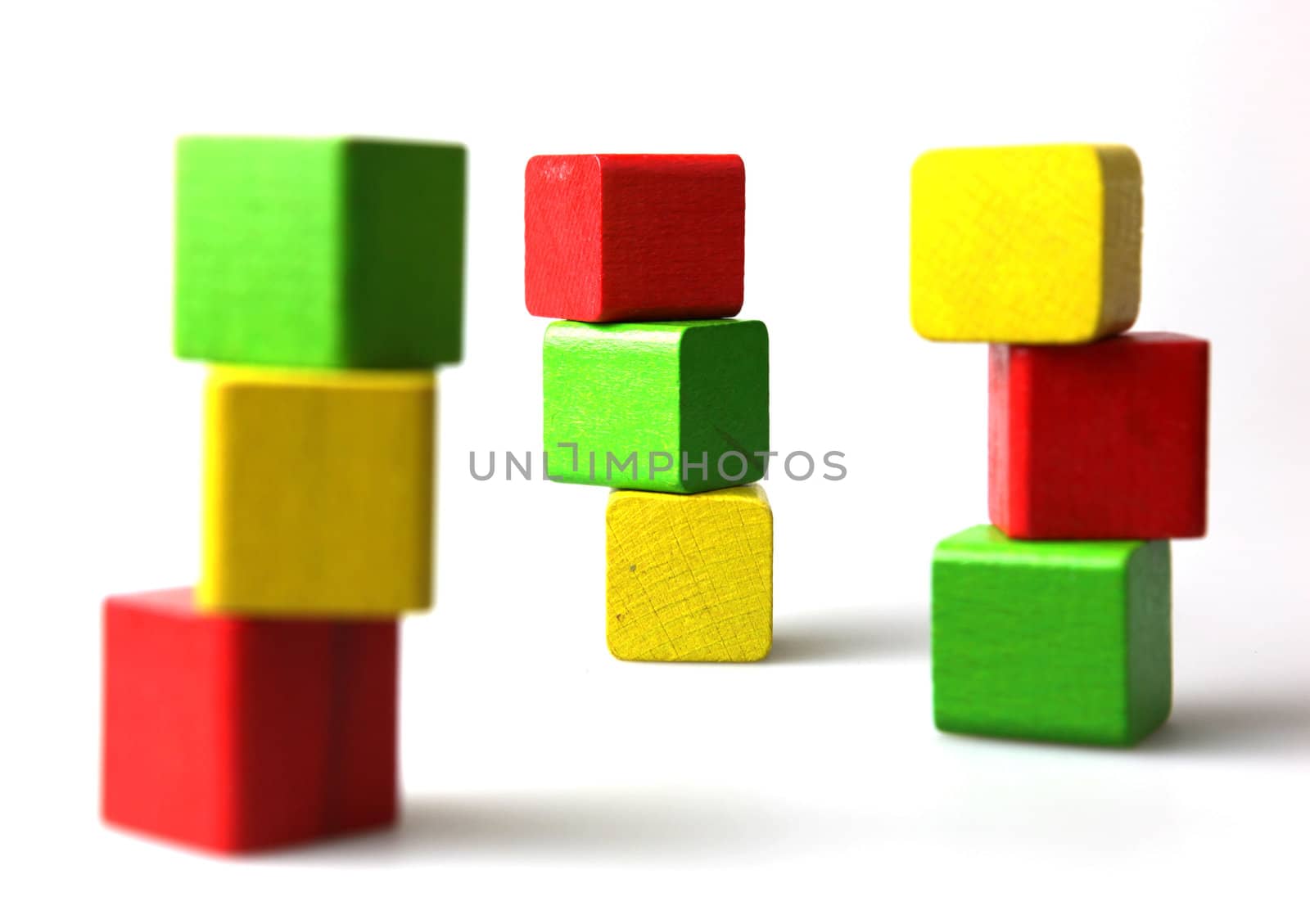 Wooden building blocks isolated on white background