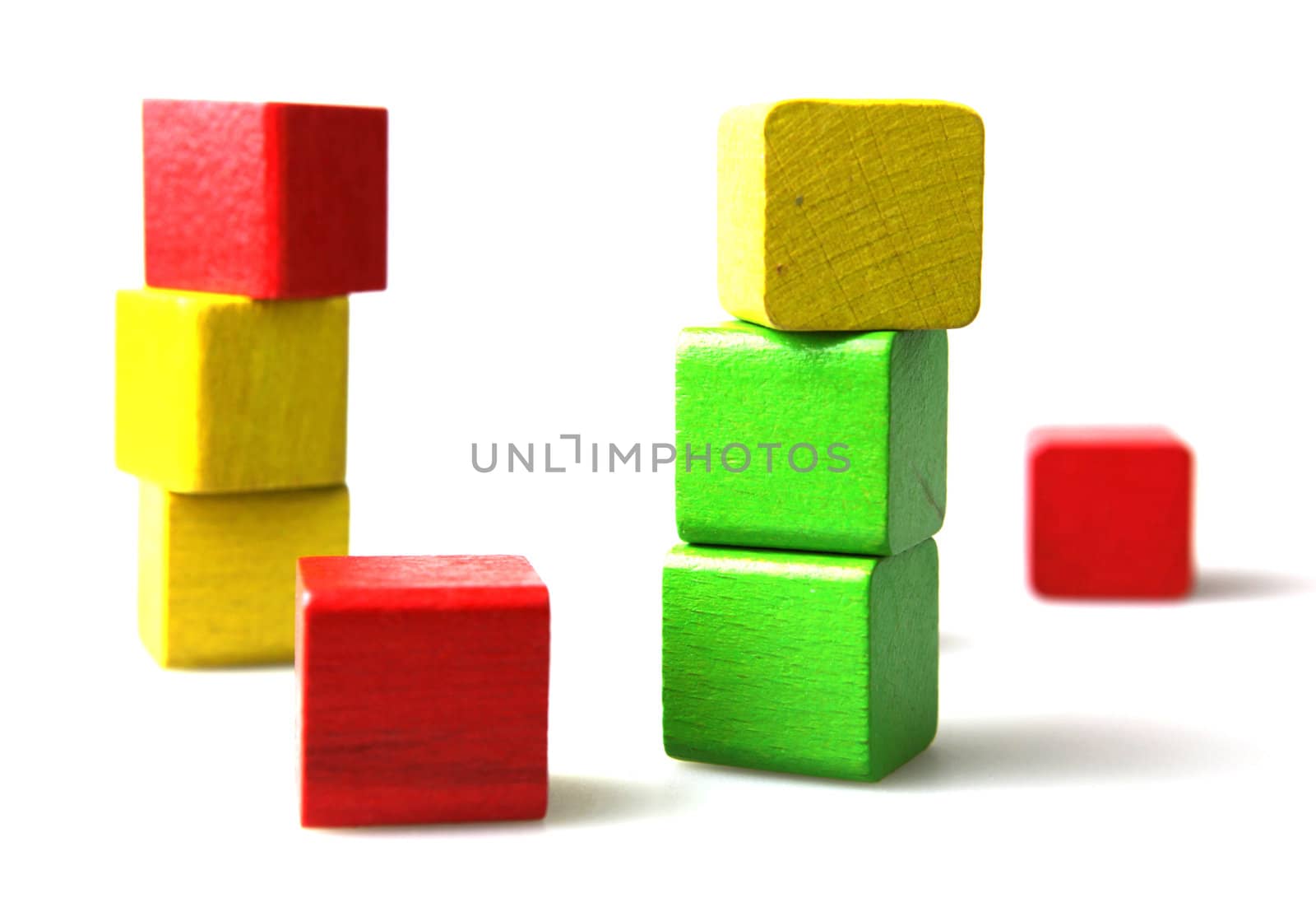 Wooden building blocks isolated on white background