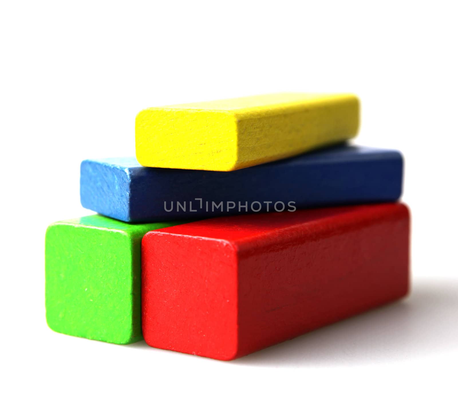 Wooden building blocks isolated on white background