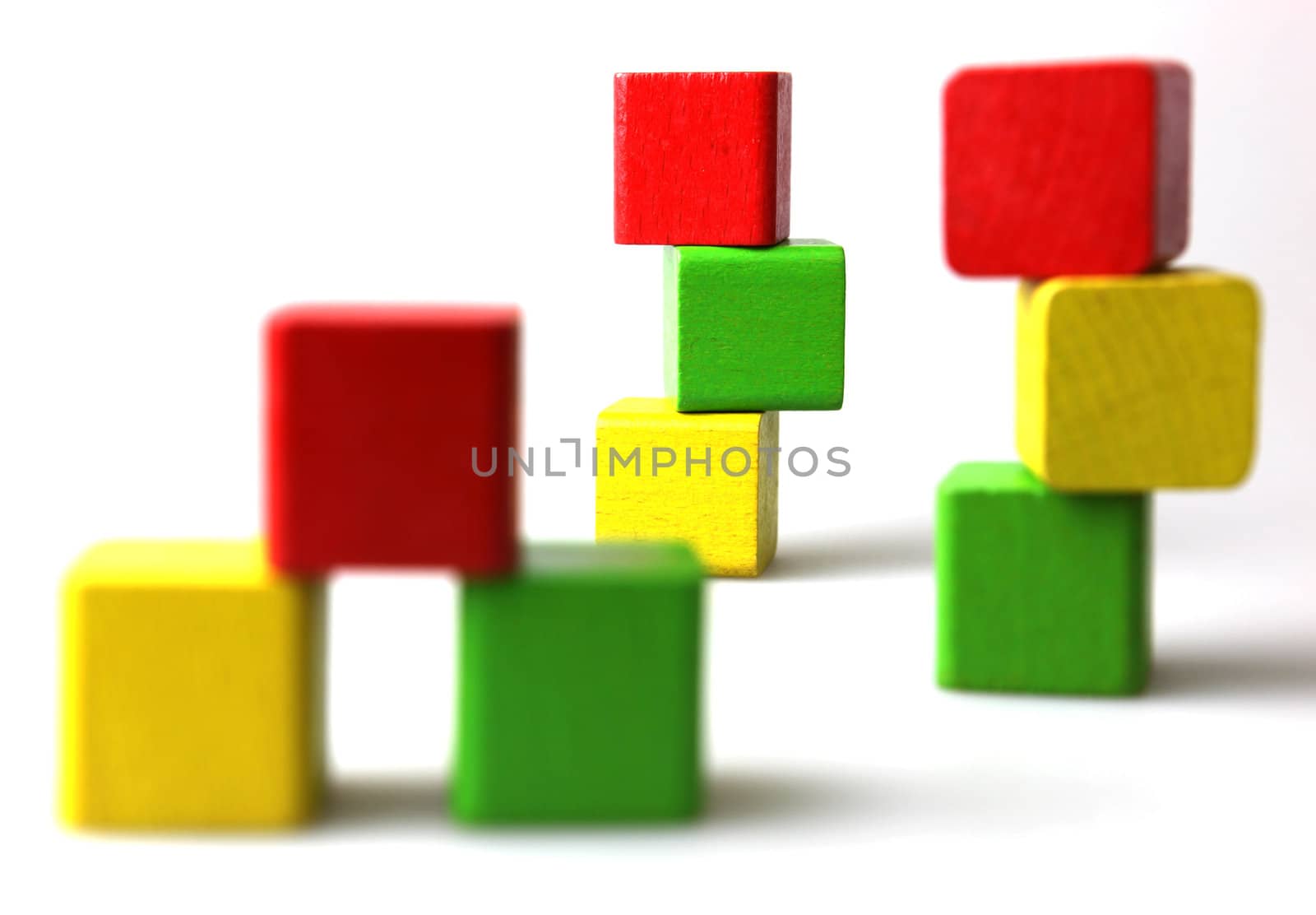 Wooden building blocks isolated on white background