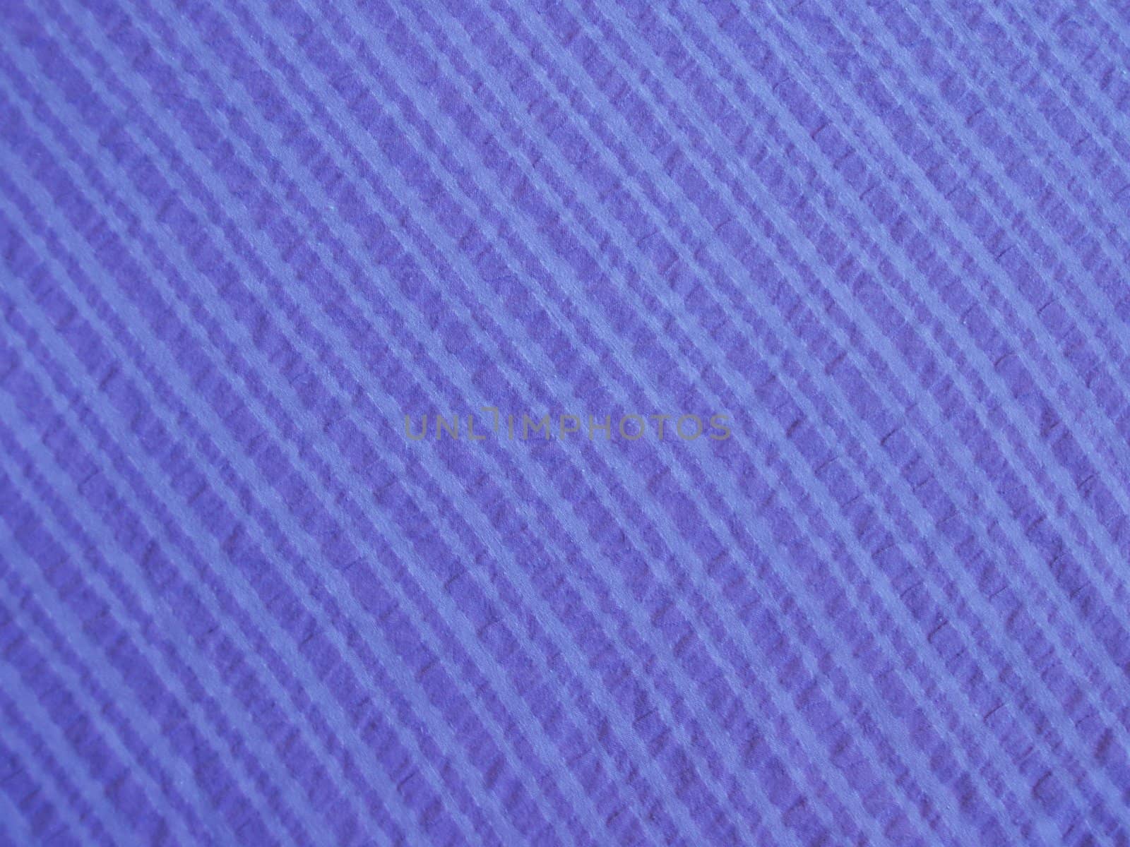 Seersucker cotton fabric. Retro style background with a fine woven structure.