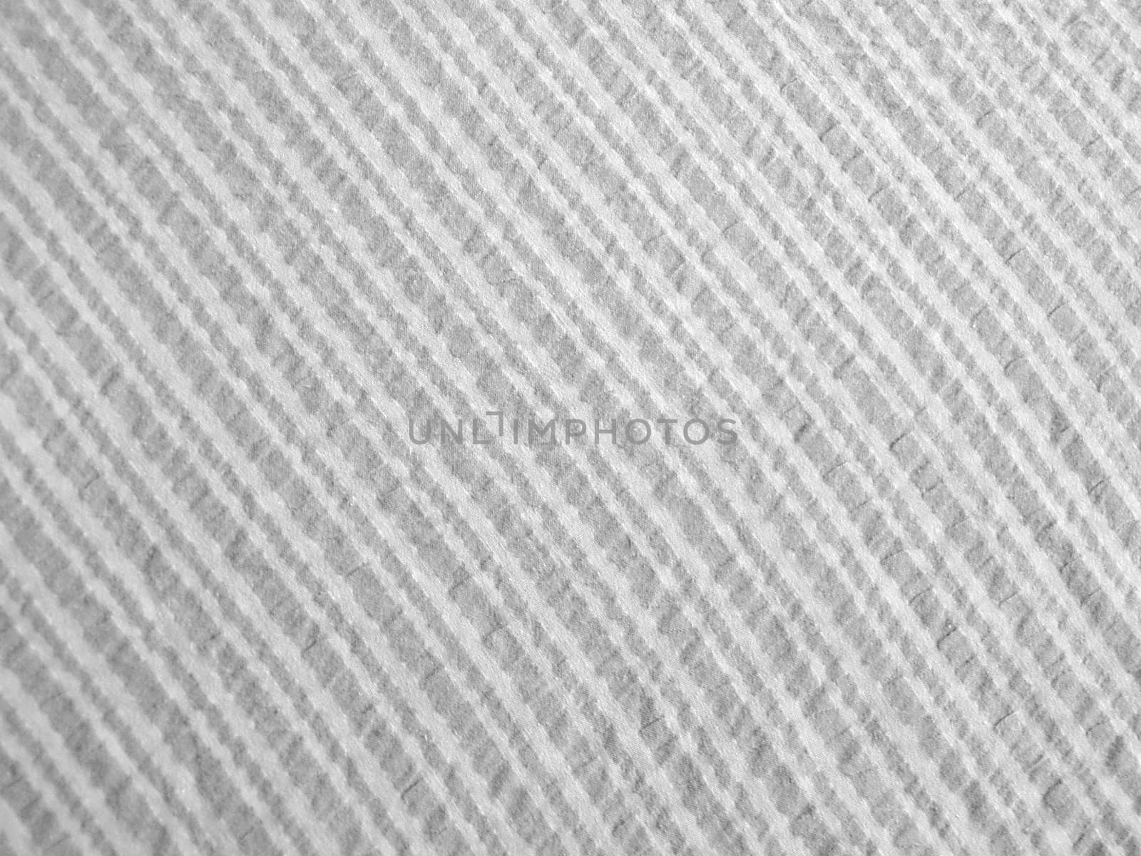 Seersucker cotton fabric. Retro style background with a fine woven structure.